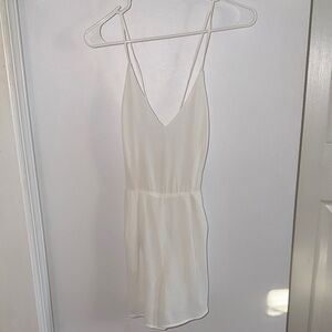 White romper, open back with pockets